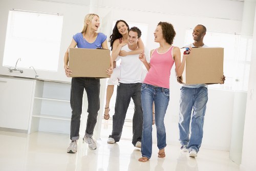Removal van and moving boxes for a Battersea home move
