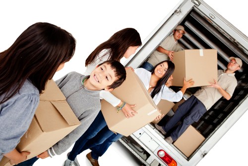 Removal team planning a move in Battersea residential street