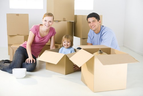 Furniture pick-up team handling bulky items in a Battersea home