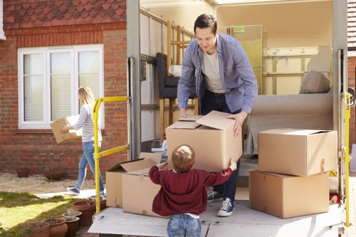 Removal team preparing boxes and furniture for a Battersea home move