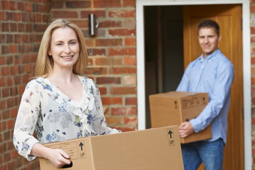 Professional movers loading furniture during a Battersea house removal