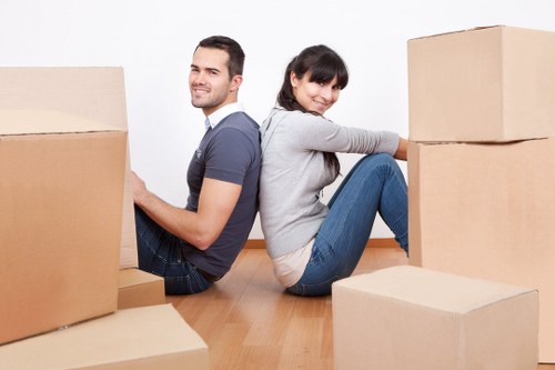 Checklist and packed household items prepared for moving day in Battersea